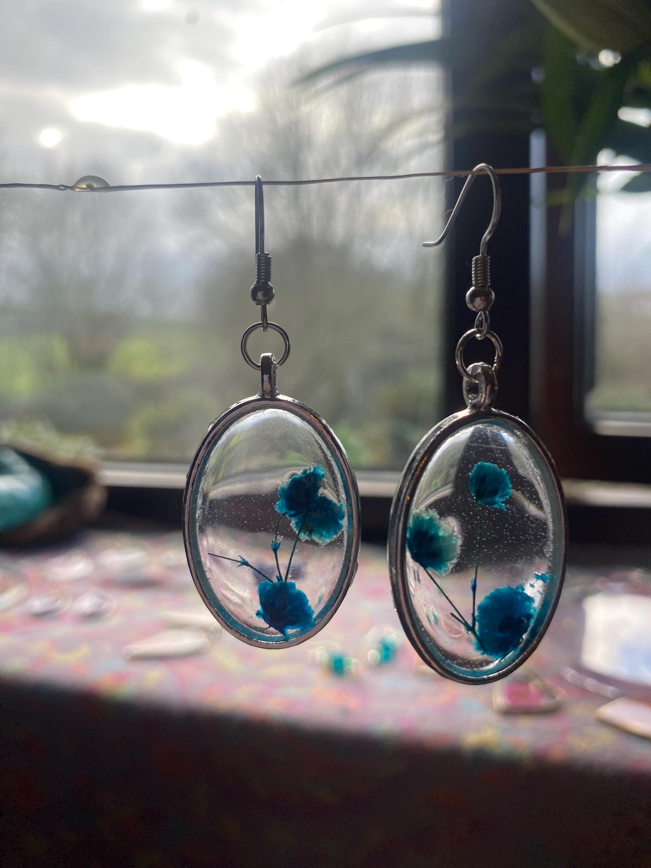 Blue Flower Resin Earrings - Clear with silver frames